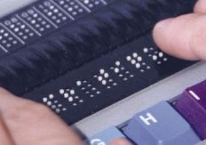 Close-up that shows some physical braille cells
